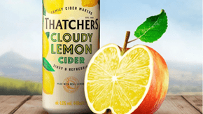 Thatchers Cloudy Lemon Cider can with sliced lemon and apple, highlighting the product at the centre of the trademark dispute with Aldi.